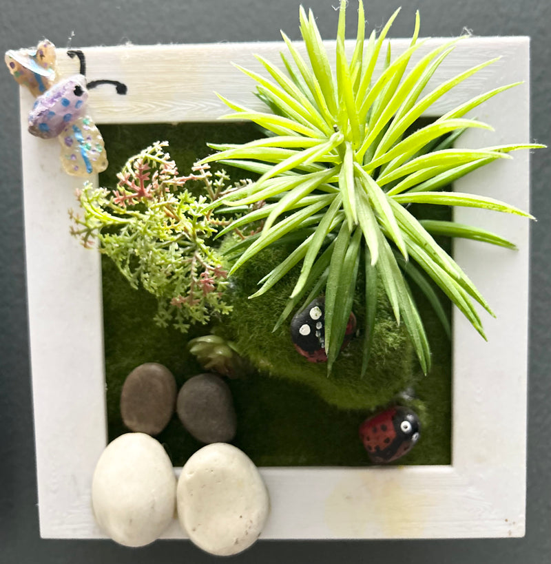 Couple pebbles artwork on wood