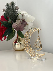 Golden acrylic crescent moon display stand featuring the word 'Allah' in elegant calligraphy.