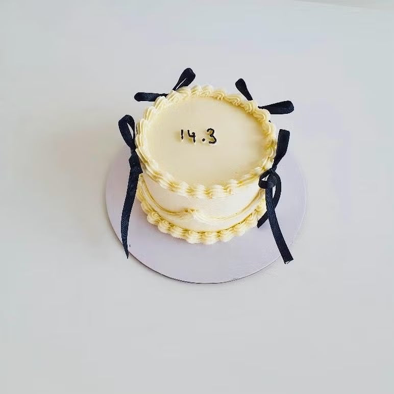 White Coquette Bow Cake